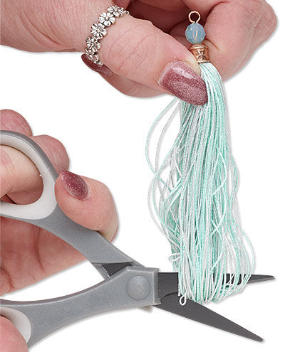 Scissors cutting thread
